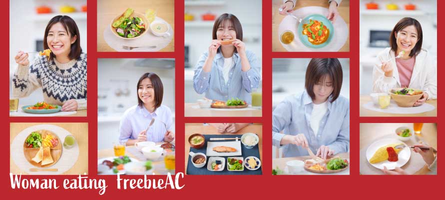食事する女性の写真